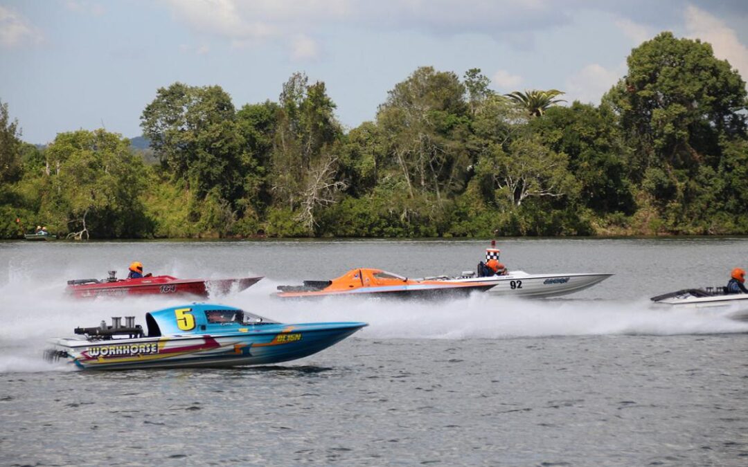 Powerboats race at high speed during the Easter Powerboat Classic on the Manning River, a highlight among adrenaline-filled events NSW hosts in April.