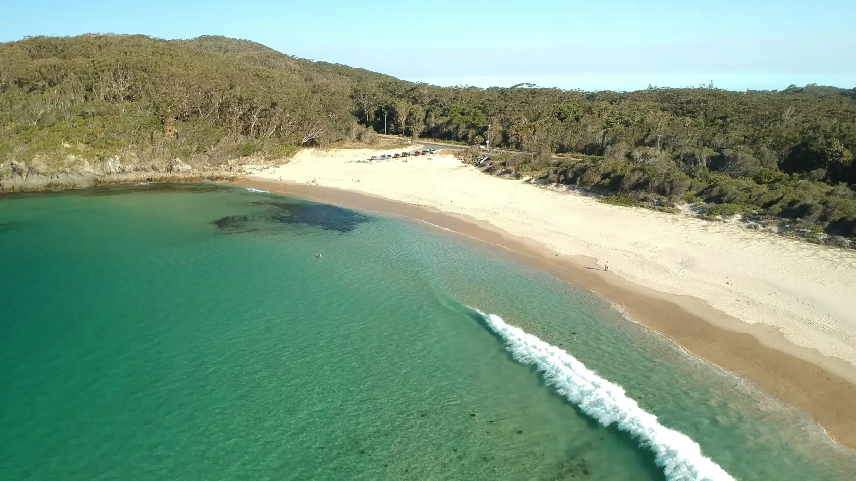 pacific-palms-with-kids-easter-autumn-school-holidays Aerial view of Elizabeth Beach at Pacific Palms, turquoise water and white sand, Barrington Coast NSW